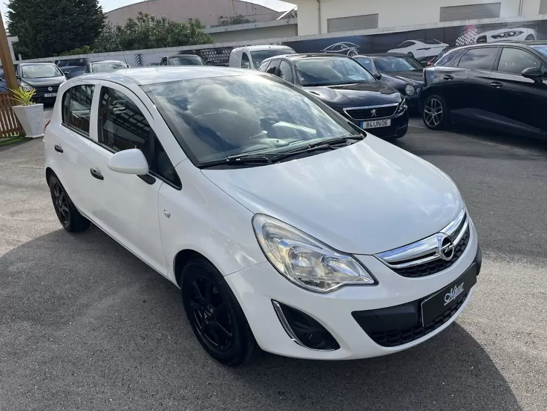 Opel Corsa 2011 - 6450 EUR, 117000 km - AUTO.MOTO.pt - 117000km - foto 40 de 50