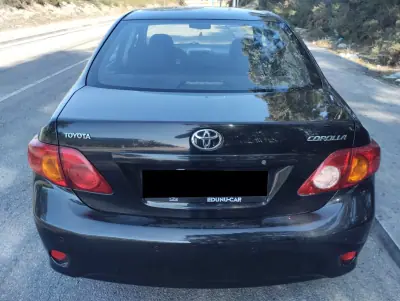 Toyota Corolla 2010 - 9750 EUR, 180000 km - foto 6 de 26
