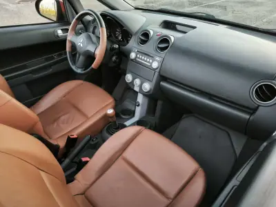 Mitsubishi Colt 2007 - 8950 EUR, 22671 km - AUTO.MOTO.pt - 22671km - foto 26 de 56