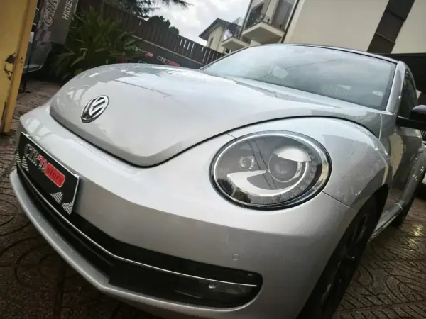 Volkswagen New Beetle 2012 - 12500 EUR, 170000 km - AUTO.MOTO.pt - 170000km - foto 14 de 26