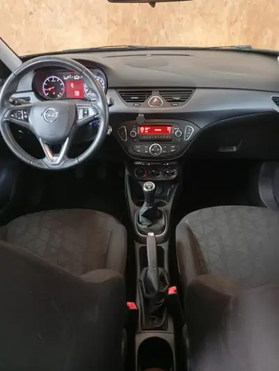 Opel Corsa 2019 - 12750 EUR, 69823 km - AUTO.MOTO.pt - 69823km - foto 13 de 19