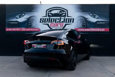 Tesla Model Y 2022 - 38900 EUR, 54000 km - AUTO.MOTO.pt - 54000km - foto 4 de 23