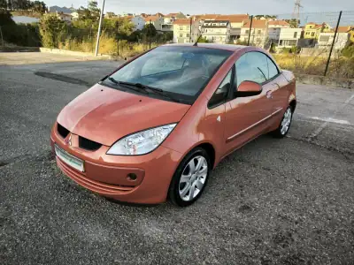 Mitsubishi Colt 2007 - 8950 EUR, 22671 km - AUTO.MOTO.pt - 22671km - foto 16 de 56