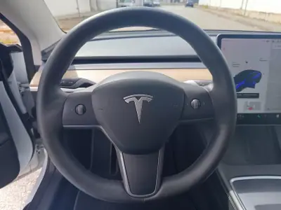 Tesla Model 3 2021 - 28990 EUR, 78600 km - 78600km - foto 15 de 18