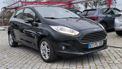 Ford Fiesta 2015 - 8450 EUR, 136200 km - AUTO.MOTO.pt - 136200km - foto 4 de 9