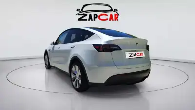 Tesla Model Y 2023 - 31900 EUR, 42638 km - AUTO.MOTO.pt - 42638km - foto 7 de 11