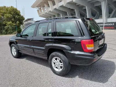 Jeep Grand Cherokee 2000 - 6490 EUR, 221450 km - AUTO.MOTO.pt - 221450km - foto 5 de 39