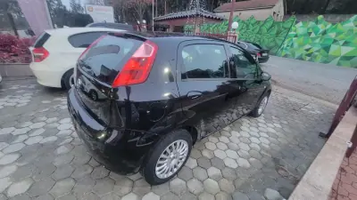 Fiat Punto 2016 - 6990 EUR, 160000 km - AUTO.MOTO.pt - 160000km - foto 8 de 13