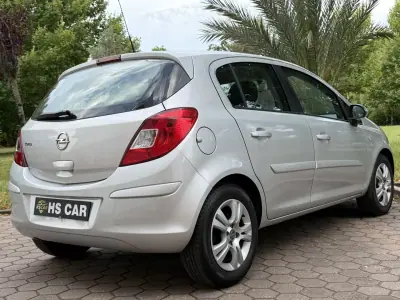 Opel Corsa 2013 - 7465 EUR, 99000 km - AUTO.MOTO.pt - 99000km - foto 8 de 41