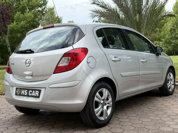 Opel Corsa 2013 - 7465 EUR, 99000 km - AUTO.MOTO.pt - 99000km - foto 8 de 41