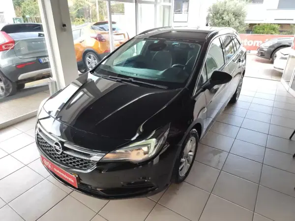 Opel Astra Sports Tourer 2016 - 8890 EUR, 174600 km - AUTO.MOTO.pt - 174600km - foto 5 de 33