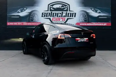 Tesla Model Y 2022 - 38900 EUR, 54000 km - AUTO.MOTO.pt - 54000km - foto 5 de 23