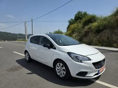 Opel Corsa 2016 - 9900 EUR, 129000 km - AUTO.MOTO.pt - 129000km - foto 15 de 15