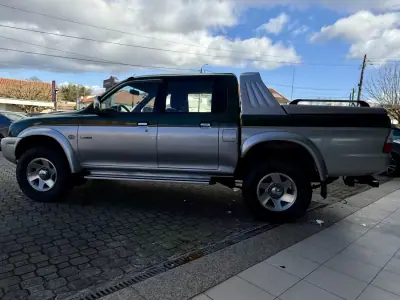 Mitsubishi L200 2002 - 13490 EUR, 214000 km - AUTO.MOTO.pt - 214000km - foto 4 de 11