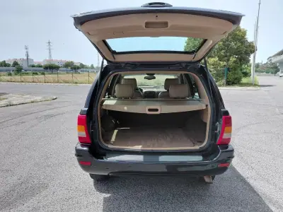 Jeep Grand Cherokee 2000 - 6490 EUR, 221450 km - AUTO.MOTO.pt - 221450km - foto 10 de 39