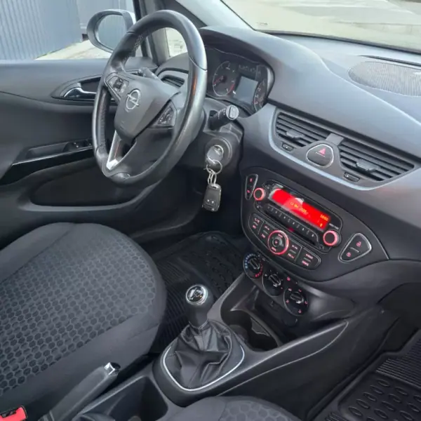 Opel Corsa 2017 - 9750 EUR, 130248 km - AUTO.MOTO.pt - 130248km - foto 9 de 19