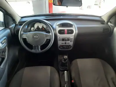 Opel Corsa 2006 - 4750 EUR, 195121 km - AUTO.MOTO.pt - 195121km - foto 7 de 7