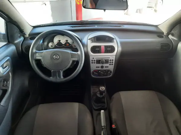 Opel Corsa 2006 - 4750 EUR, 195121 km - AUTO.MOTO.pt - 195121km - foto 7 de 7