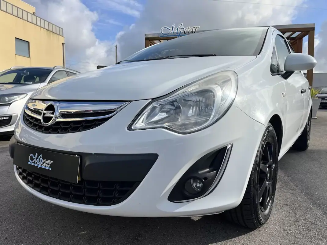 Opel Corsa 2011 - 6450 EUR, 117000 km - AUTO.MOTO.pt - 117000km - foto 38 de 50