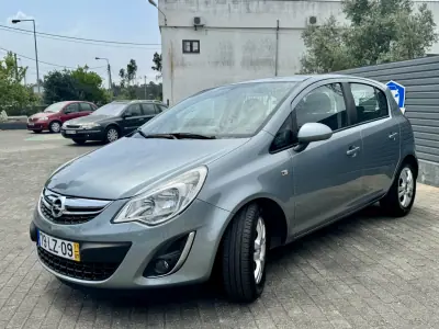 Opel Corsa 2011 - 6950 EUR, 212000 km - AUTO.MOTO.pt - 212000km - foto 8 de 19