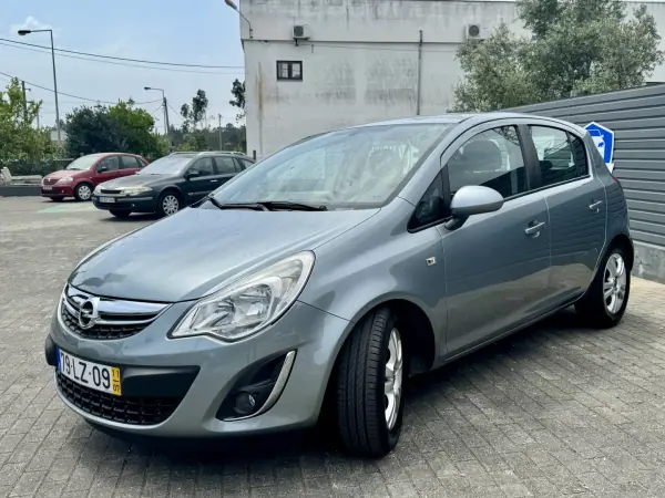 Opel Corsa 2011 - 6950 EUR, 212000 km - AUTO.MOTO.pt - 212000km - foto 8 de 19