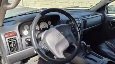 Jeep Grand Cherokee 2003 - 16900 EUR, 170000 km - AUTO.MOTO.pt - 170000km - foto 7 de 9