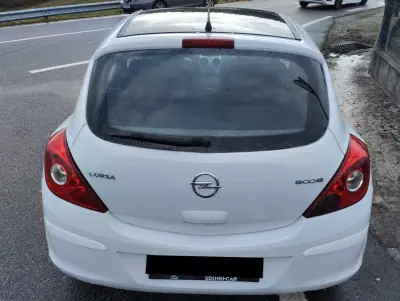 Opel Corsa 2011 - 5900 EUR, 220000 km - AUTO.MOTO.pt - 220000km - foto 6 de 24