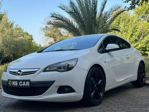 Opel Astra GTC 2012 — foto 3 de 39
