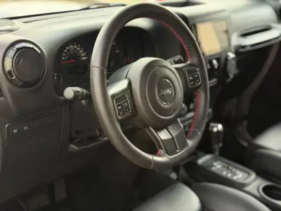 Jeep Wrangler Unlimited 2014 - 78500 EUR, 95000 km - 95000km - foto 24 de 31