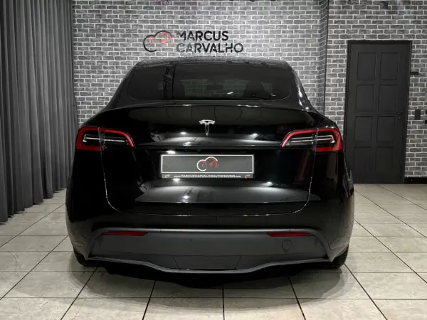 Tesla Model Y 2022 - 34900 EUR, 77000 km - AUTO.MOTO.pt - 77000km - foto 5 de 14