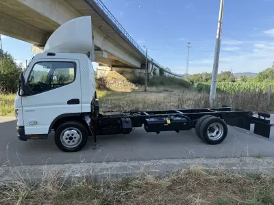 Mitsubishi FUSO CANTER 3C15 AC/ABS DUONIC PLATAFORMA DHOLLANDIA 2022 - 28900 EUR, 190000 km - AUTO.MOTO.pt - 190000km - foto 9 de 26