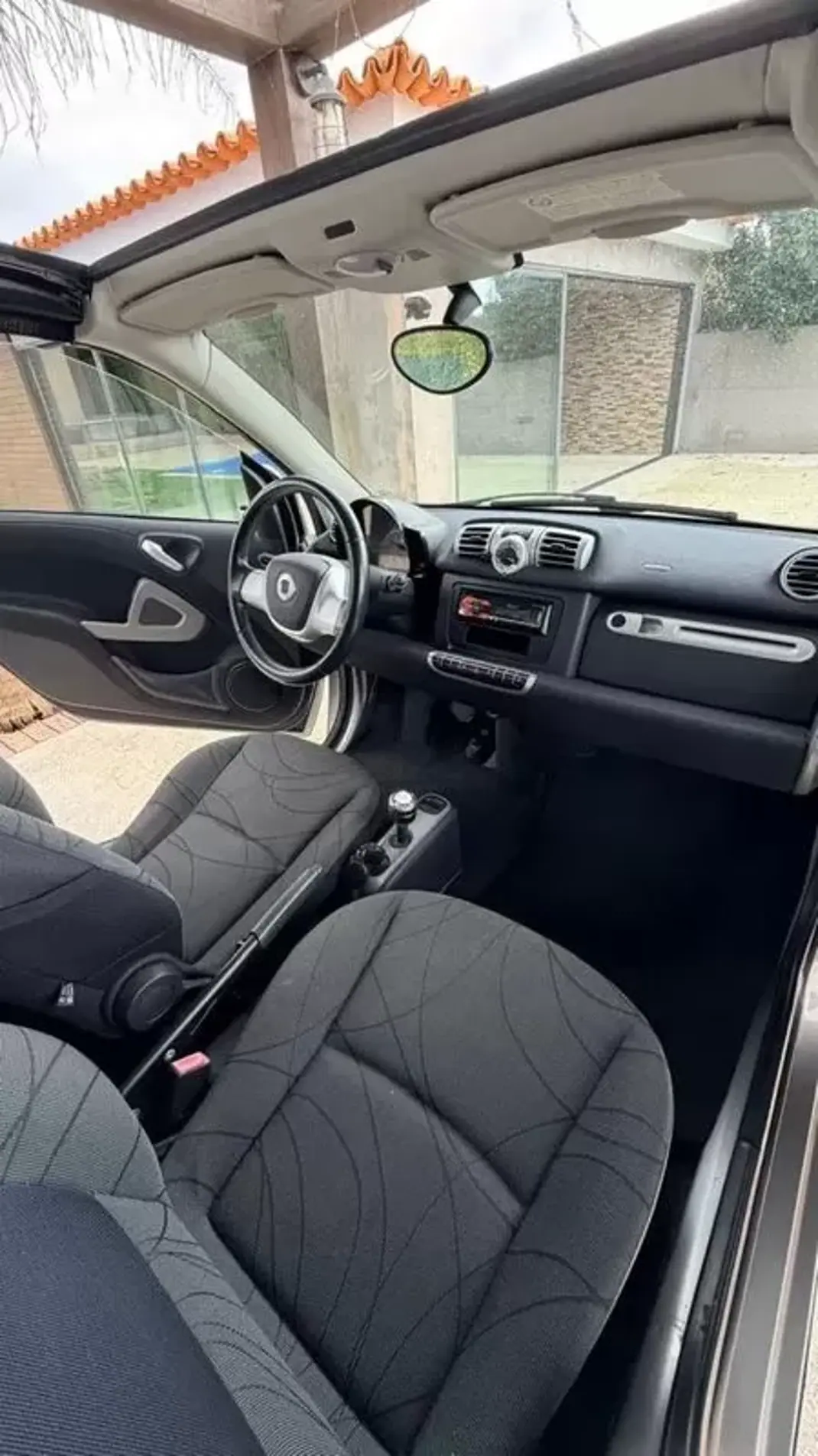 Smart Fortwo Cabrio 2013 - 7999 EUR, 113669 km - AUTO.MOTO.pt - 113669km - foto 8 de 25