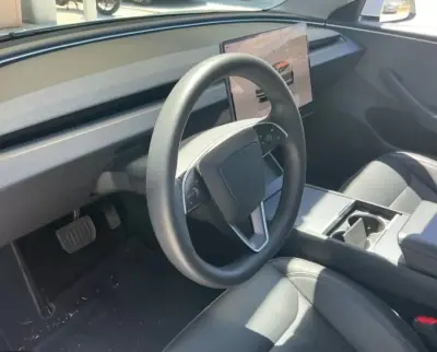 Tesla Model 3 2023 - 34900 EUR, 55778 km - AUTO.MOTO.pt - 55778km - foto 7 de 8