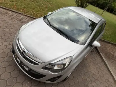 Opel Corsa 2013 - 7465 EUR, 99000 km - AUTO.MOTO.pt - 99000km - foto 7 de 41