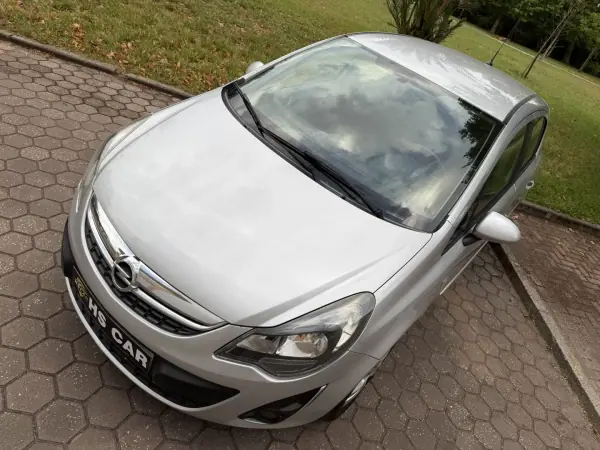 Opel Corsa 2013 - 7465 EUR, 99000 km - AUTO.MOTO.pt - 99000km - foto 7 de 41