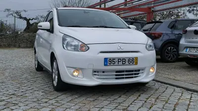 Mitsubishi Space Star 2014 - 7750 EUR, 125476 km - AUTO.MOTO.pt - 125476km - foto 4 de 7