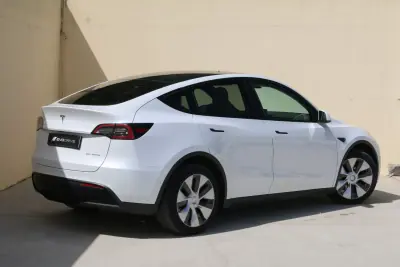 Tesla Model Y 2022 - 34490 EUR, 74000 km - AUTO.MOTO.pt - 74000km - foto 4 de 9