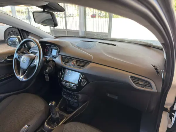 Opel Corsa 2016 - 8950 EUR, 95315 km - AUTO.MOTO.pt - 95315km - foto 26 de 27