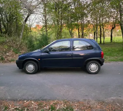 Opel Corsa 1997 - 1500 EUR, 263600 km - AUTO.MOTO.pt - 263600km - foto 7 de 18