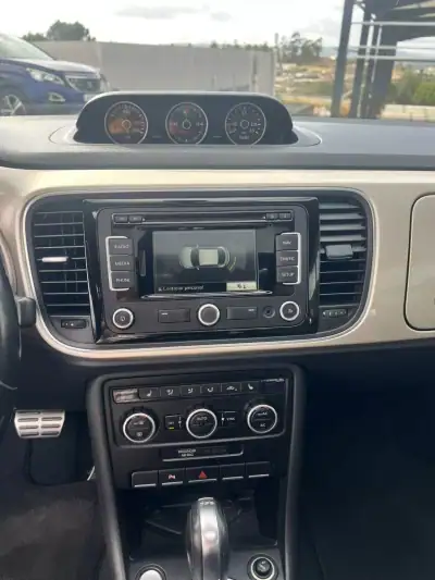 Volkswagen New Beetle 2014 - 16500 EUR, 203975 km - AUTO.MOTO.pt - 203975km - foto 9 de 9