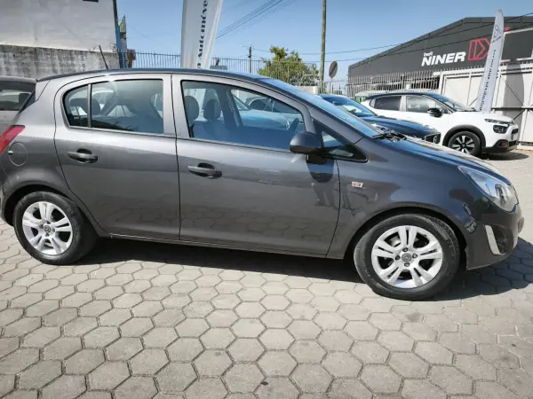 Opel Corsa 2011 - 6900 EUR, 189500 km - AUTO.MOTO.pt - 189500km - foto 4 de 14