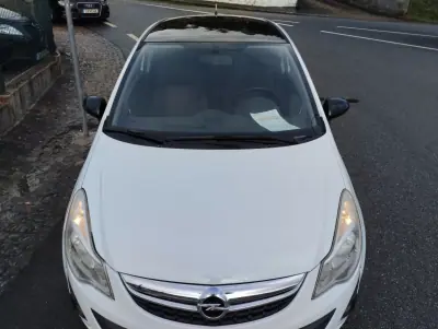 Opel Corsa 2011 - 5900 EUR, 220000 km - AUTO.MOTO.pt - 220000km - foto 9 de 24