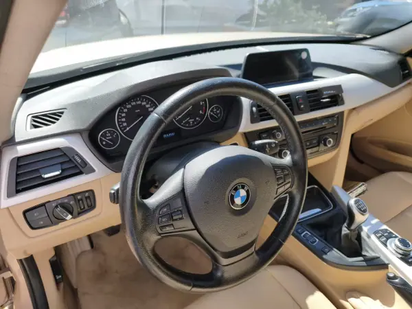 BMW 318 2014 - 14900 EUR, 185655 km - AUTO.MOTO.pt - 185655km - foto 9 de 21