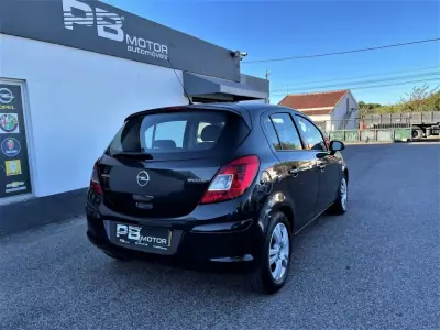 Opel Corsa 2013 - 9750 EUR, 171082 km - AUTO.MOTO.pt - 171082km - foto 4 de 12