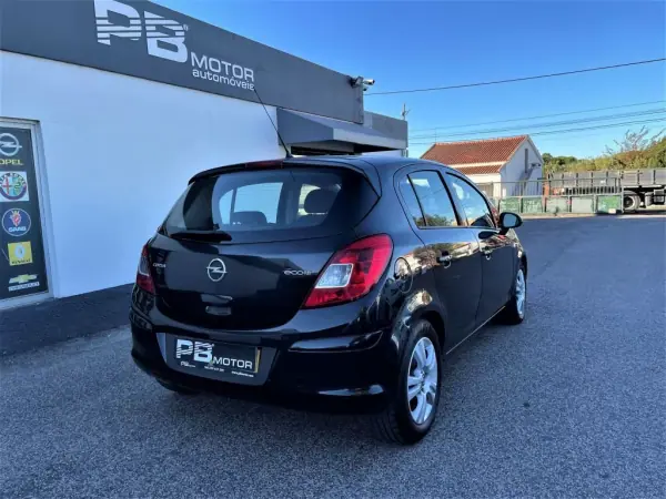 Opel Corsa 2013 - 9750 EUR, 171082 km - AUTO.MOTO.pt - 171082km - foto 4 de 12