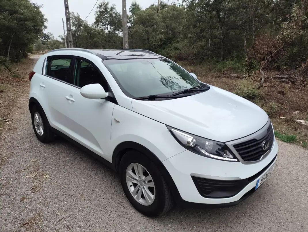Kia Sportage 2013 - 8990 EUR, 204320 km - 204320km - foto 4 de 14