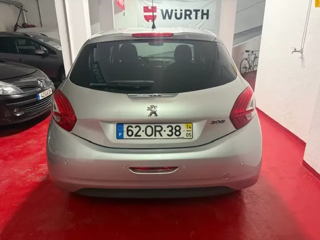 Peugeot 208 2014 - 7400 EUR, 116000 km - AUTO.MOTO.pt - 116000km - foto 5 de 26
