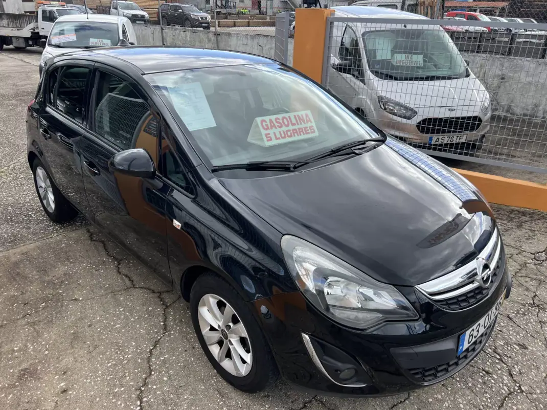 Opel Corsa 2014 - 6450 EUR, 136121 km - AUTO.MOTO.pt - 136121km - foto 8 de 23