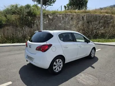 Opel Corsa 2016 - 9900 EUR, 129000 km - AUTO.MOTO.pt - 129000km - foto 11 de 15