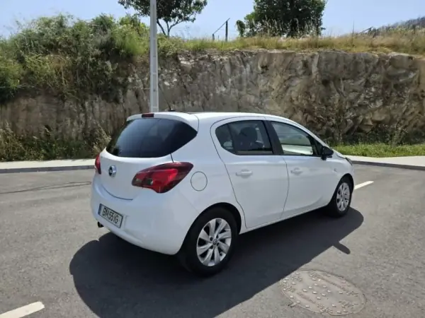 Opel Corsa 2016 - 9900 EUR, 129000 km - AUTO.MOTO.pt - 129000km - foto 11 de 15